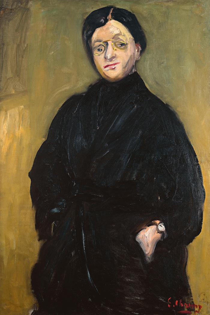 Portrait d'une femme portant des lunettes.