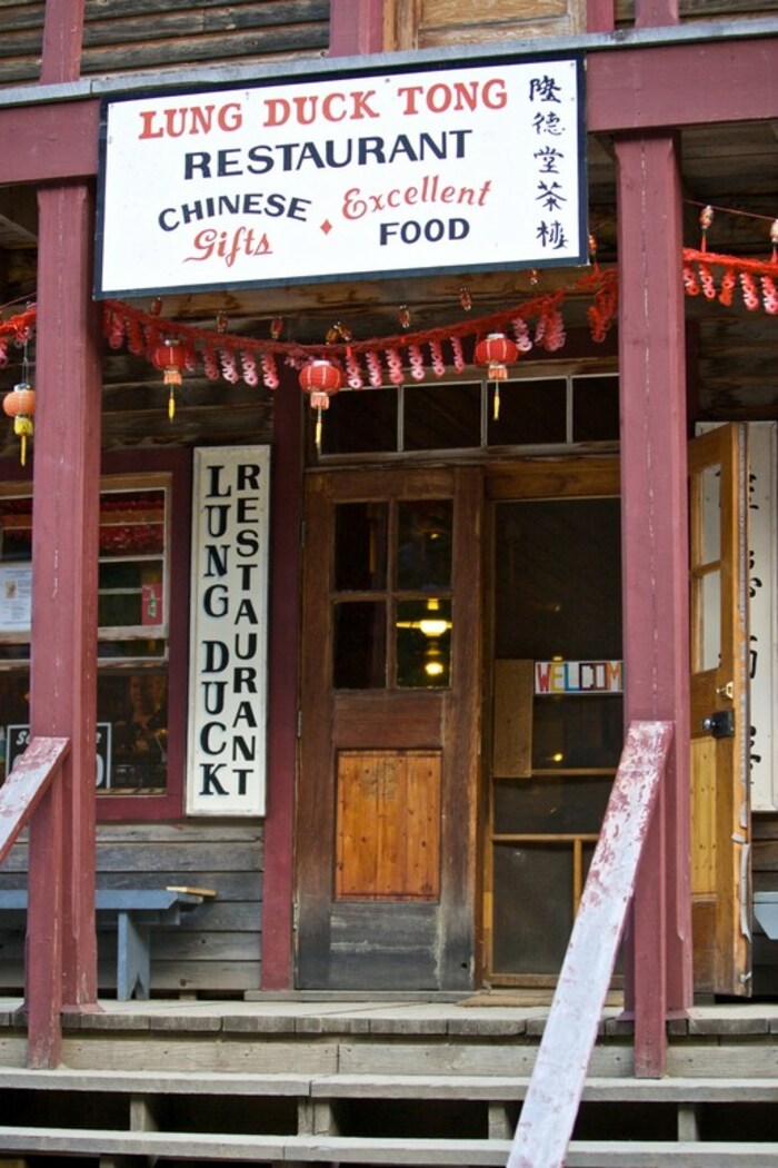 The wooden entrance door of a Chinese restaurant