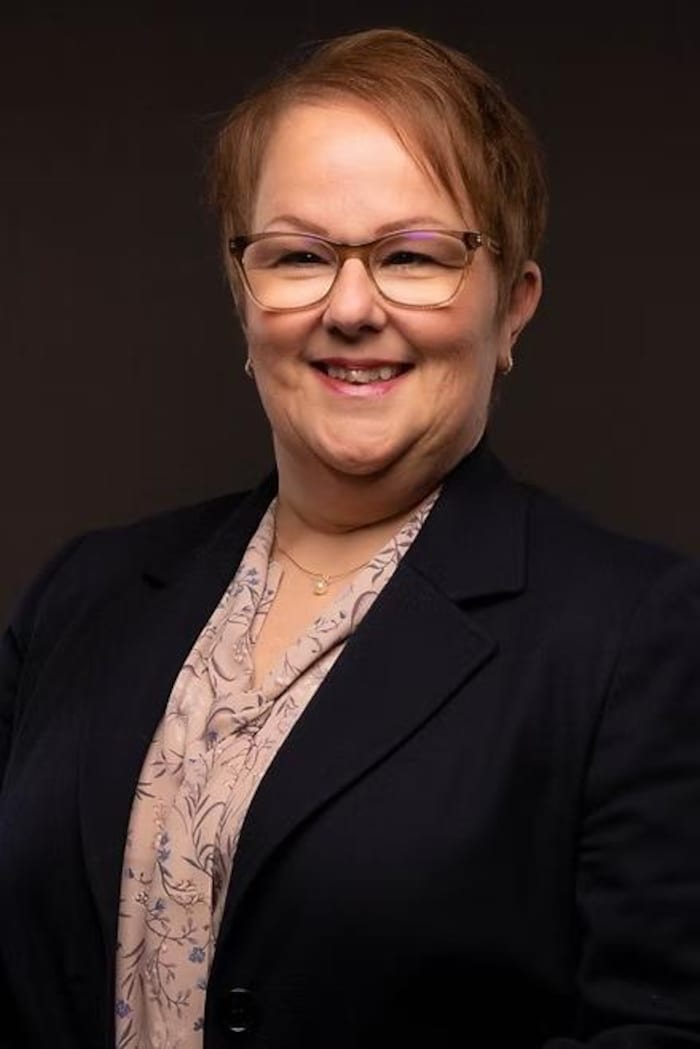 Josée Rioux-Walker sourit à la caméra.