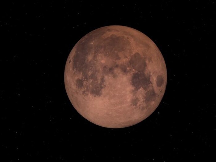 Visualisation artistique d'une éclipse totale de la Lune.
