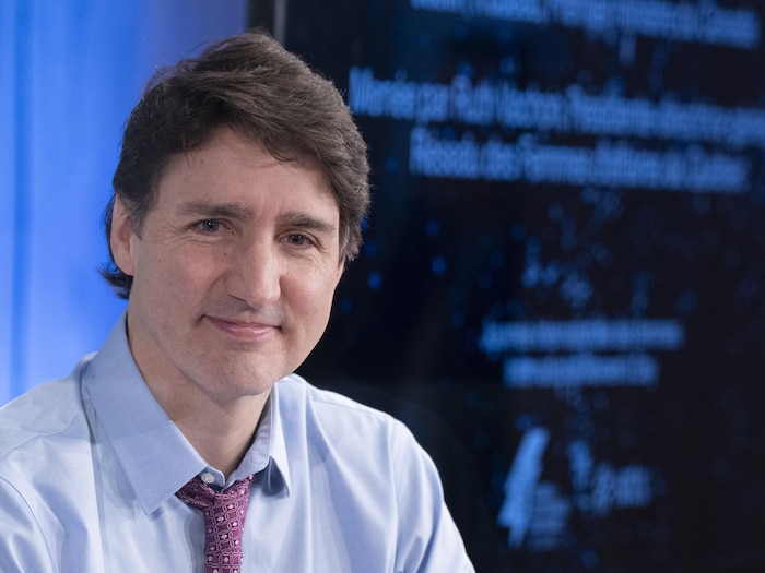 Portrait de Justin Trudeau, tout sourire.