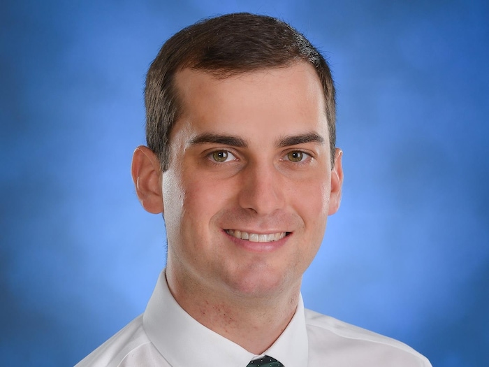 Dr Michael Reaume.
