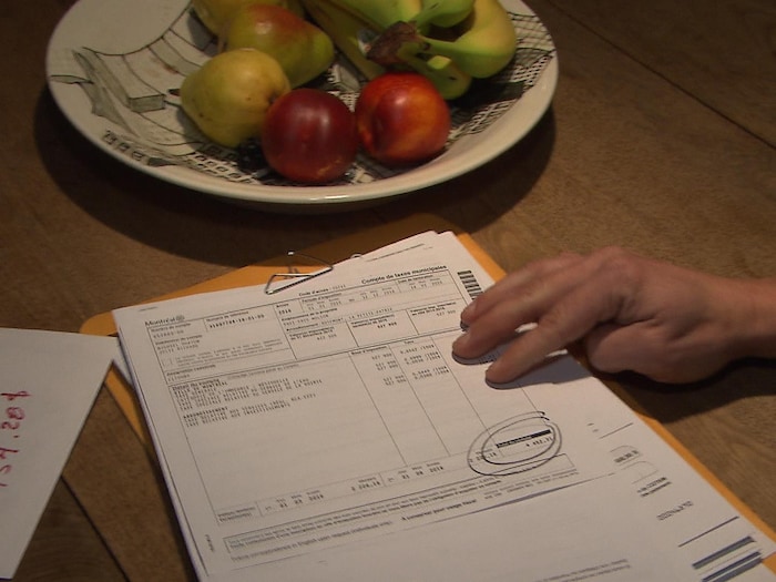 Un document indiquant le montant des taxes municipales à payer.