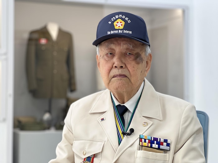 Oh Choul-Whan poses in uniform.