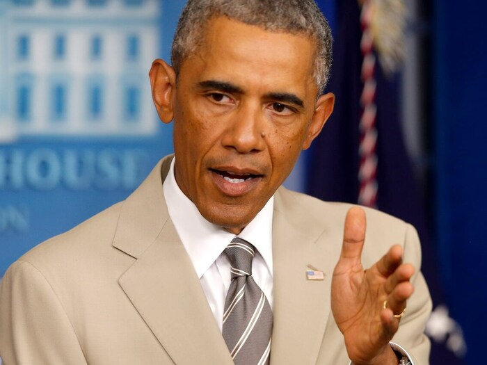 L'ancien président américain Barack Obama s'adresse aux médias lors d'une conférence de presse portant sur l'État islamique à Washington, le 24 août 2014.