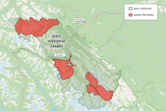 Une carte avec trois zones rouges dans le parc national Jasper.