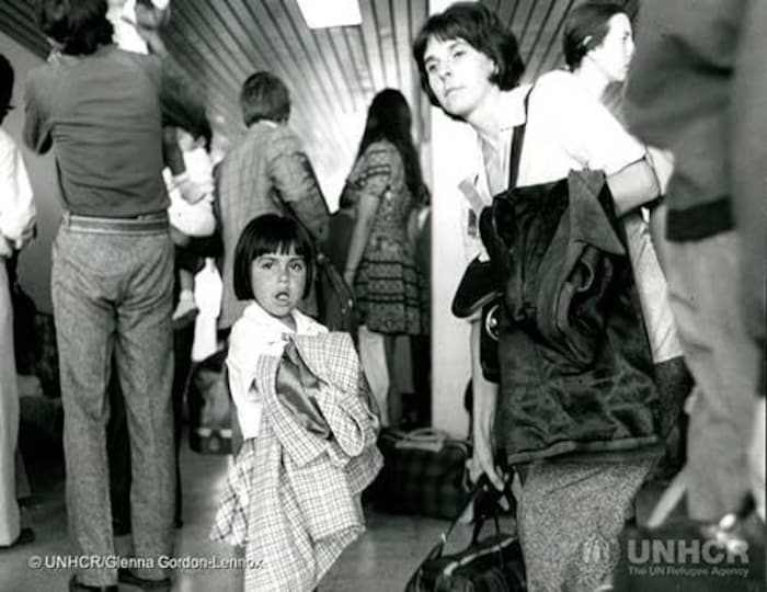 A Chilean mother and daughter prepare to leave Santiago for Canada, c. 1974.

