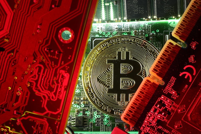 Une pièce de monnaie représentant un bitcoin