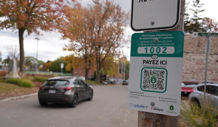 Code QR à numériser pour payer le stationnement.