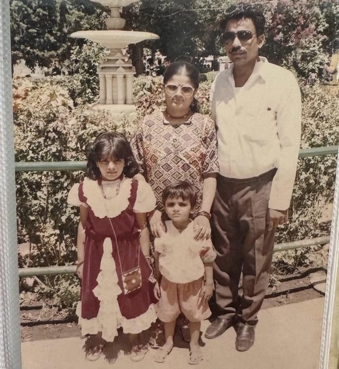 Seven-year-old Satya on family vacation in western Rajasthan in India. From left, Satya, her brother Surya, mom Saroj and dad Shailesh Amin.