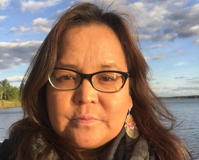 Selfie of Tania Cameron on waterfront.