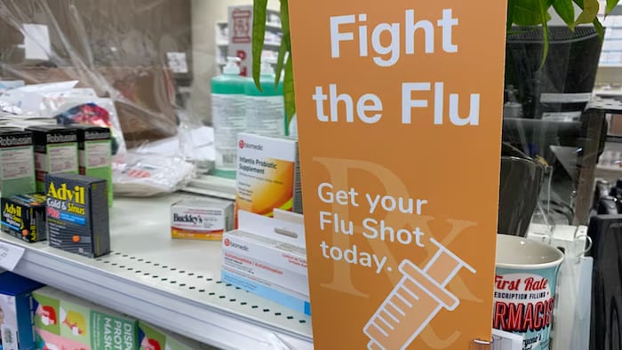Une affiche en anglais d'une campagne contre la grippe saisonnière en Alberta.