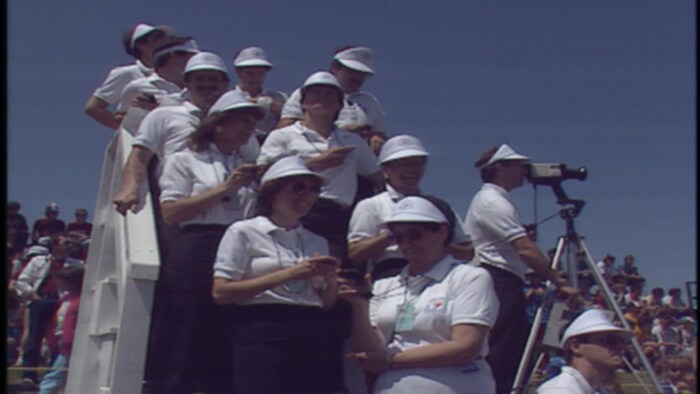 Gens avec des chronomètres.