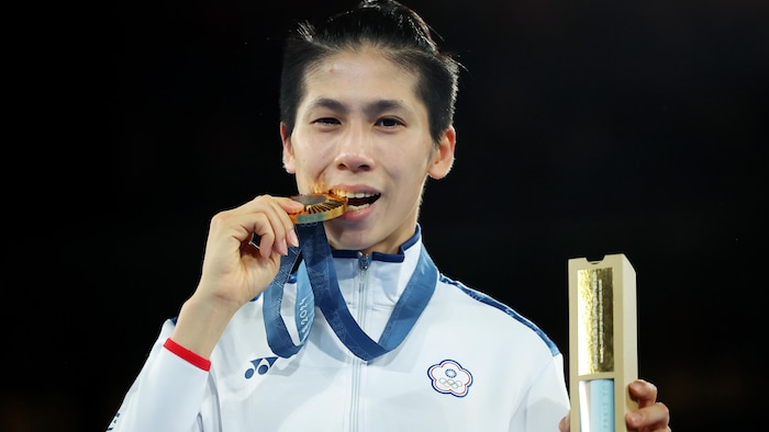 Lin Yu-ting a mordu sa médaille.