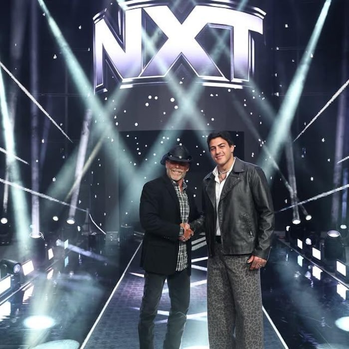 They shake hands in front of the NXT logo. first steps shady elnahas judoka