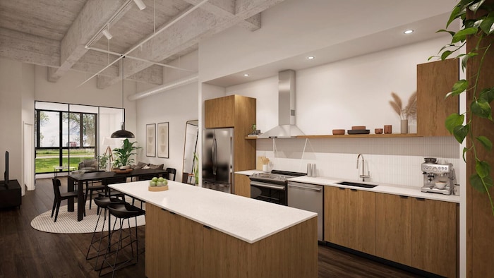 A model of the kitchen that opens into a small dining room.