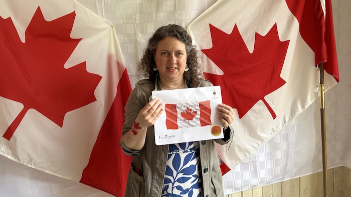 A woman. "i am proud canadian": canada