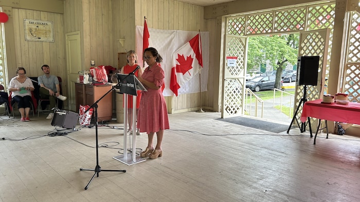 A woman. "i am proud canadian": canada
