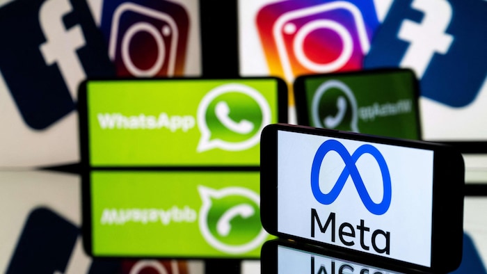Les logos de Meta, WhatsApp, Instagram et Facebook sur des écrans.