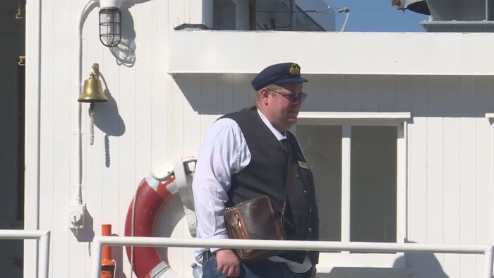 Captain Michael Lomow aboard the SS Moyie.
