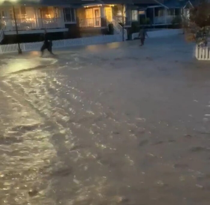 A street in Abbotsford's Clayburn Village neighbourhood is flooded with water after several rainfall warnings and a flood watch was issued for the Fraser Valley on Sunday.