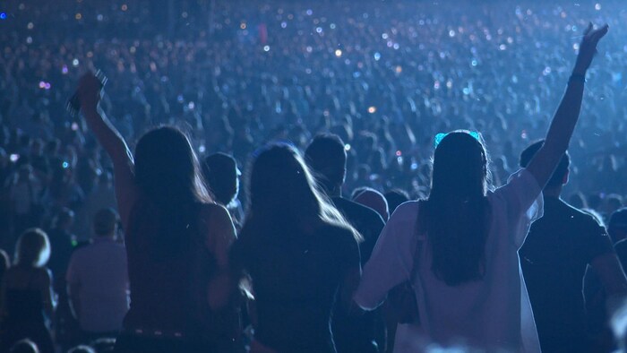 Des spectateurs au festival Osheaga.