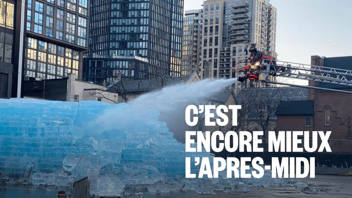 Des pompiers arrosent un bloc de glace géant.