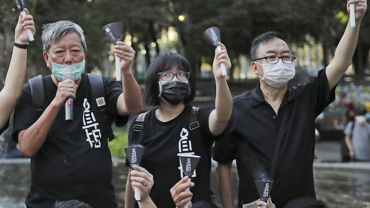 李卓人、邹幸彤及张文光。
