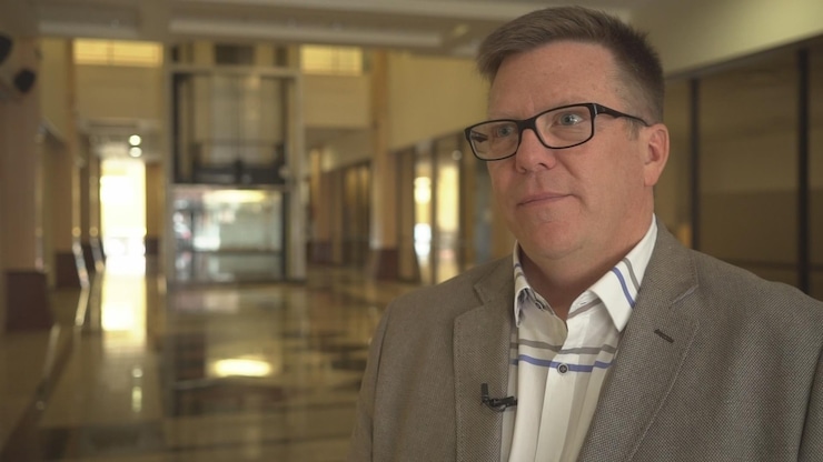 Former CSIS Asia-Pacific Bureau Chief Michel Juneau-Katsuya testifies before Parliament on Monday. He says he wishes policy-makers had listened to his warnings in the 1990s. (CBC)