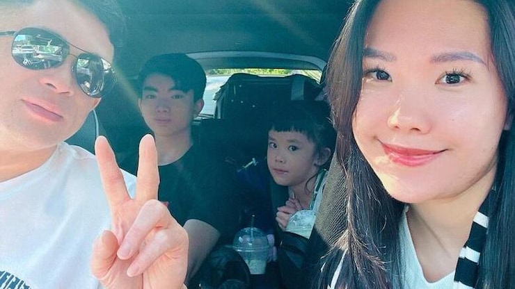 黎安迪(译自 Andy Le)和爸爸、继母和妹妹的合照。