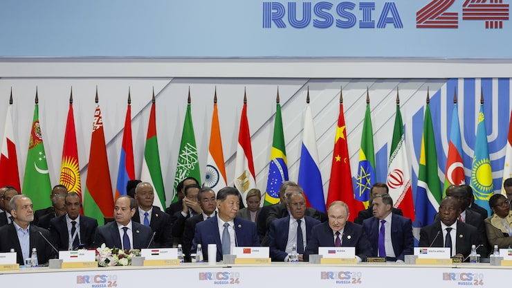 FILE - From left, Iranian President Masoud Pezeshkian, Egyptian President Abdel Fattah el-Sisi, Chinese President Xi Jinping, Russian President Vladimir Putin, South African President Cyril Ramaphosa, Ethiopian Prime Minister Abiy Ahmed and Brazilian Foreign Minister Mauro Vieira attend the Outreach/BRICS Plus format session at the BRICS Summit in Kazan, Russia, Thursday, Oct. 24, 2024. (Maxim Shemetov, Pool Photo via AP, File)