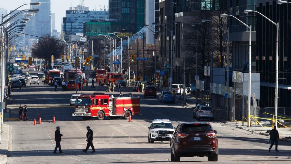 TORONTO, ON - APRIL 23: Police work the scene on Yonge St. at near Finch Ave., after a van plowed into pedestrians on April 23, 2018 in Toronto, Canada. A suspect identified as Alek Minassian, 25, is in custody after a driver in a white rental van collided with multiple pedestrians killing nine and injuring at least 16. (Photo by Cole Burston/Getty Images)