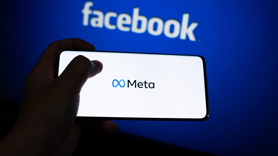 Le logo de Meta sur un appareil mobile.
