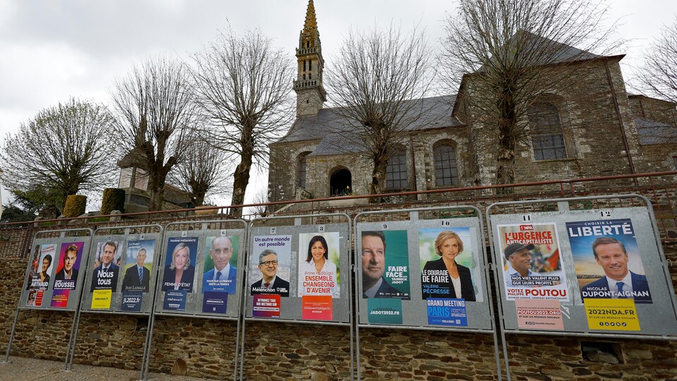 Election posters of twelve candidates contesting the first round of the presidential election in France.