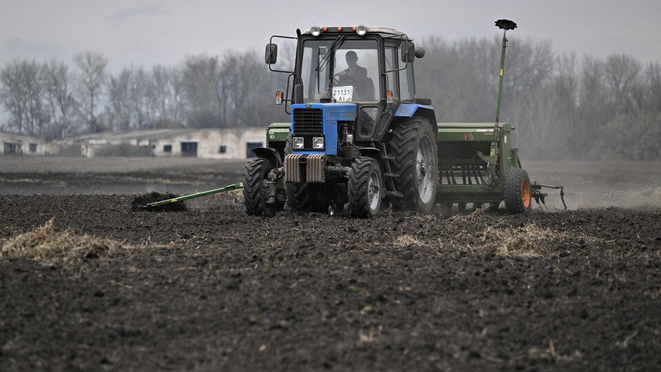 A tractor is plowing a field.