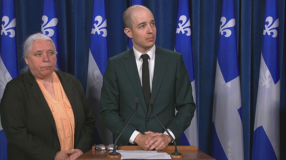 Manon Massey and Alexandre Leduc at a press conference.