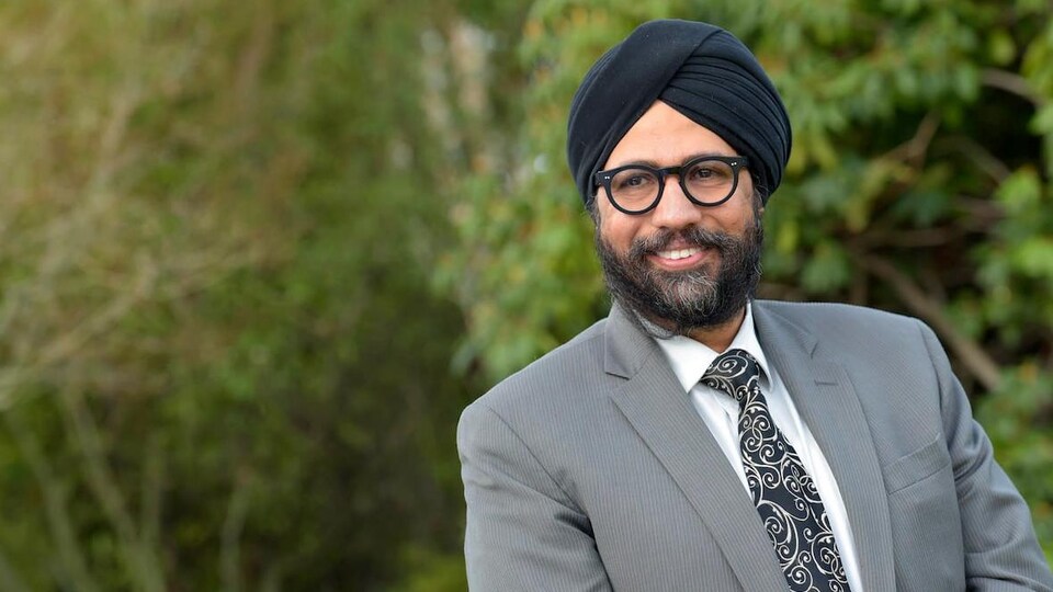 Aman Singh, souriant.
