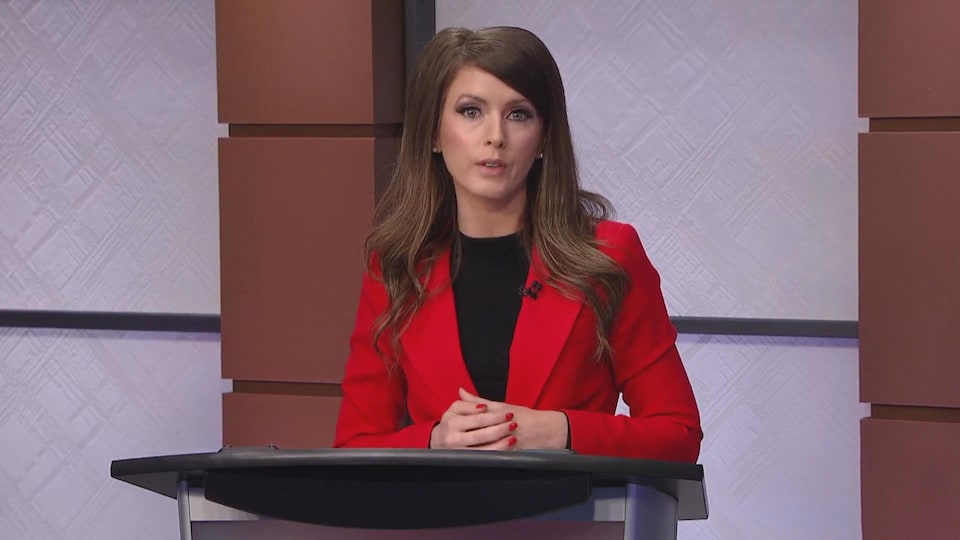 Liberal candidate Amanda Smart answers a question during a televised debate.