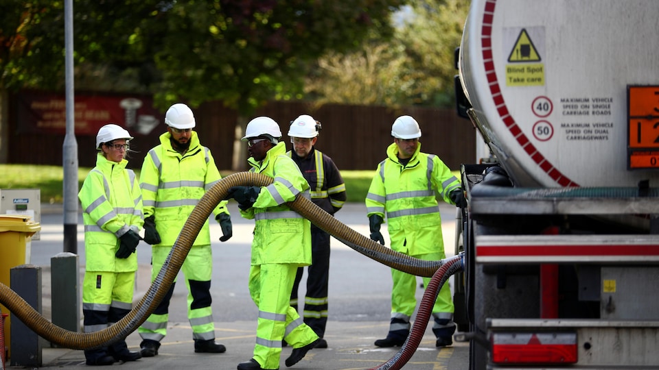 Members of the British Army were assigned to deliver petrol to a gas station.