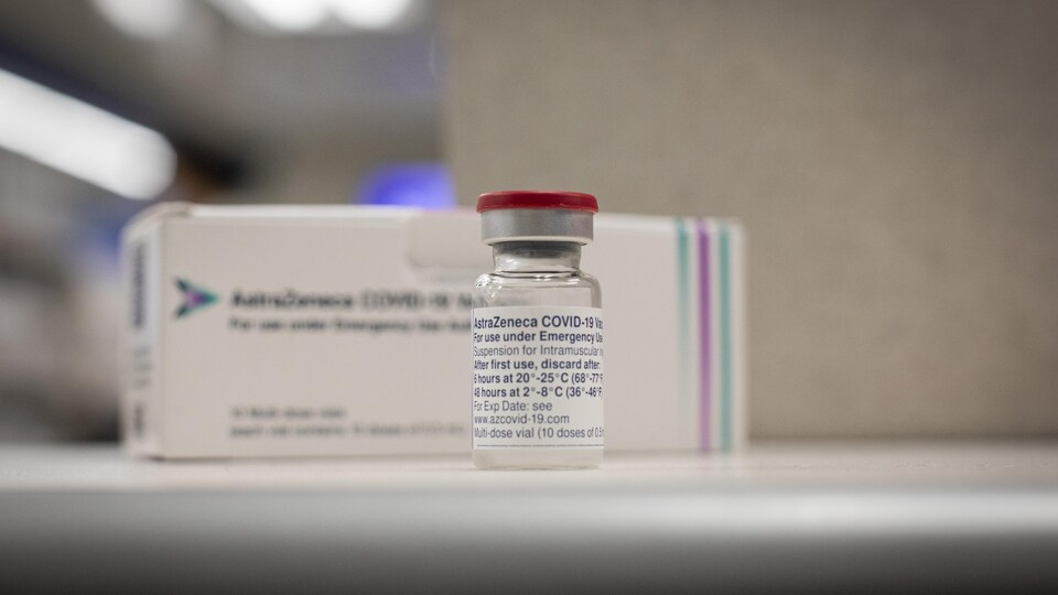 A vial of AstraZeneca's COVID-19 vaccine with an English label.