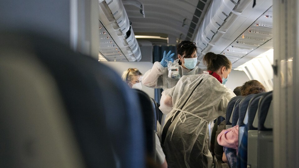 Images génériques à l’intérieur d’un vol de Air Canada en période de pandémie. 