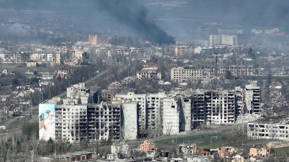 Smoke rises from burning buildings in Baghmud, eastern Ukraine.