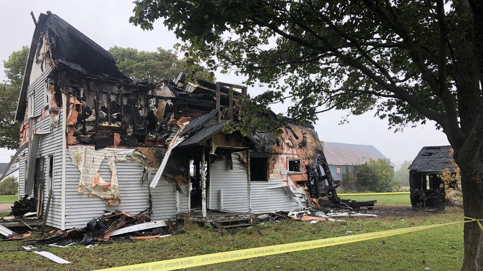 The roof and back of the house were destroyed.