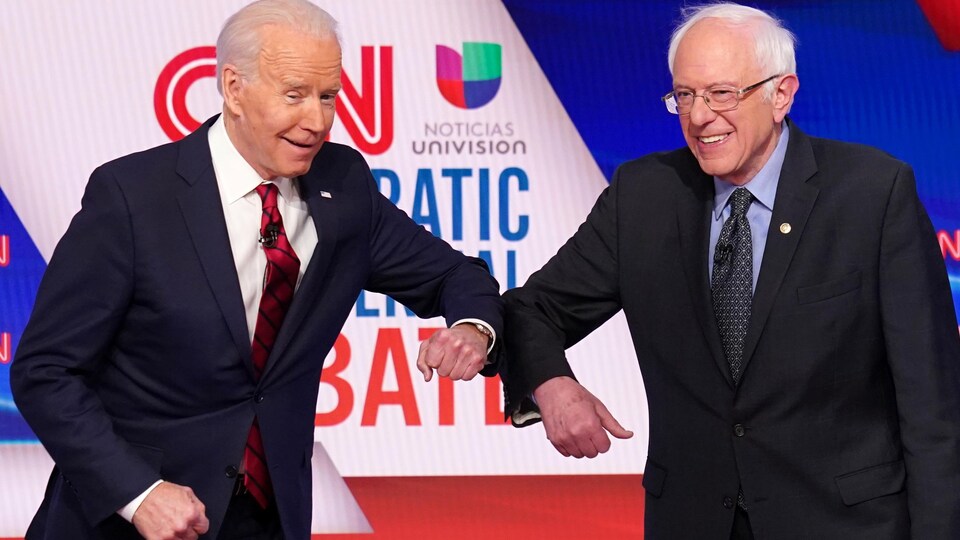 Joe Biden et Bernie Sanders lors d'un débat sur les ondes de CNN.