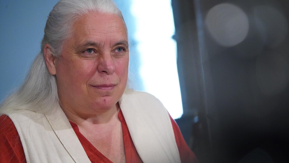 A woman tied her hair in front.