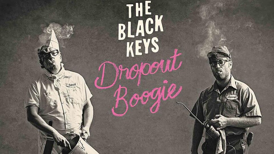 Les membres du duo des Black Keys déguisés en cuisinier et en garagiste. 