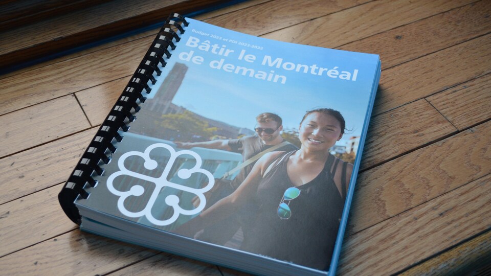 A paper copy of the City of Montreal's 2023 budget.