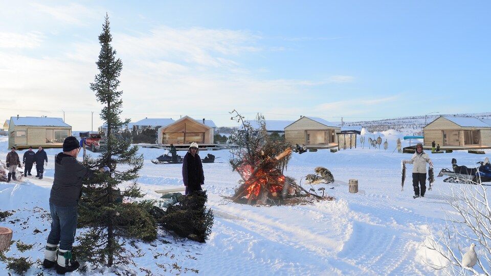 Des cabanes de bois sont installées en demi-cercle autour d'une sorte d'agora où s'affairent des gens.
