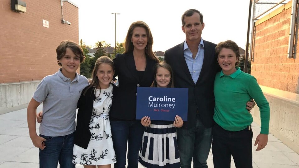 Caroline Mulroney is with her partner and her four children. 