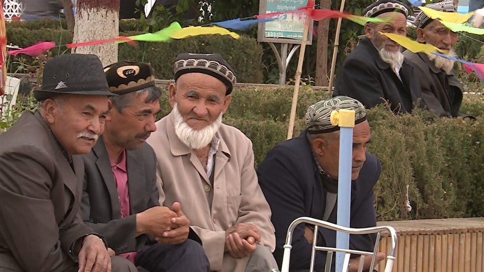 Des Ouïgours dans la région de Xinjiang, en Chine.